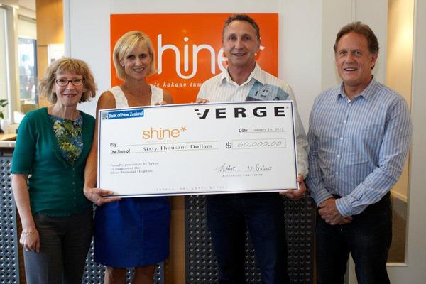 Verge Design Director Ian Webster (second from right) presenting the cheque to the team at Shine.